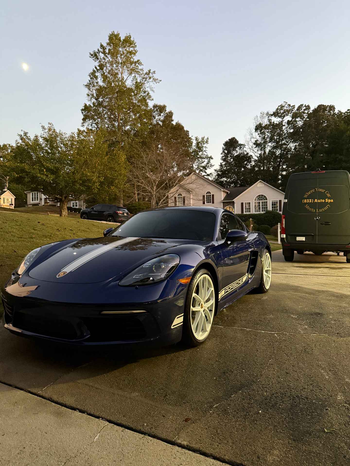 Porsche Cayman with ceramic coating at dusk
